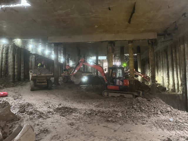 Basement construction underway beneath a piled perimeter wall
