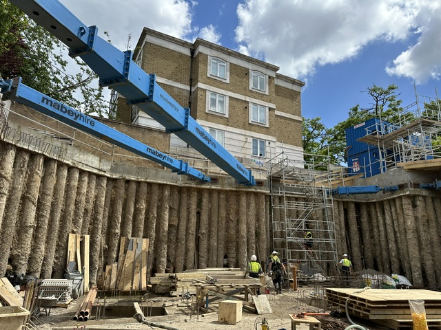 Secant pile retaining wall beside an existing residential building